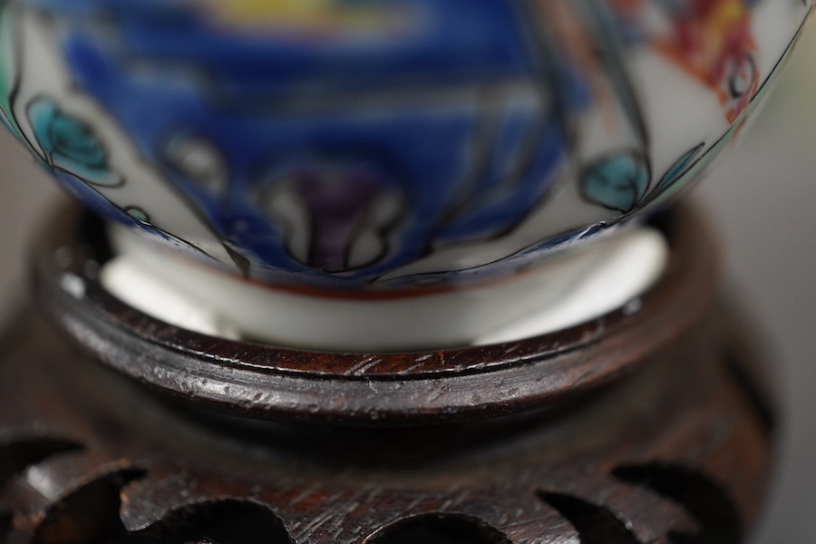 A near pair of Chinese famille rose ‘double pheasant’ coffee cups, early Qianlong period